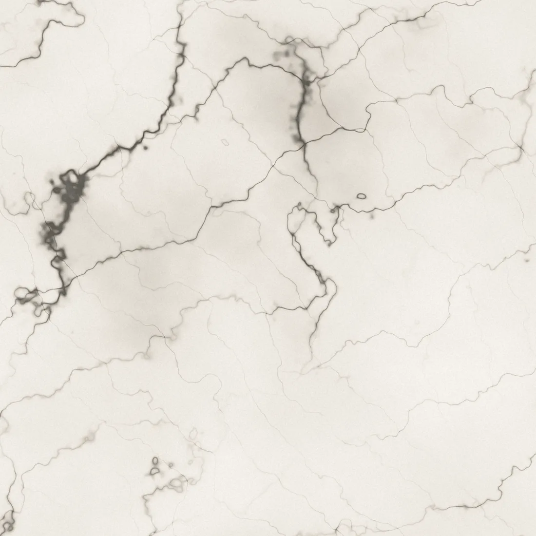 White marble surface with soft grey veining.